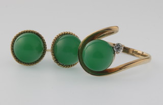 A 14ct yellow gold jade and diamond scroll ring, size K and a pair of matching ear studs