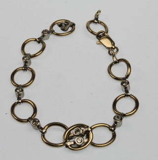 A 9ct gold gem set open link bracelet 7.9 grams