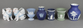 A pair of 19th Century bisque spill vases in the form of seated pug dogs, 5 items of Wedgwood Jasperware