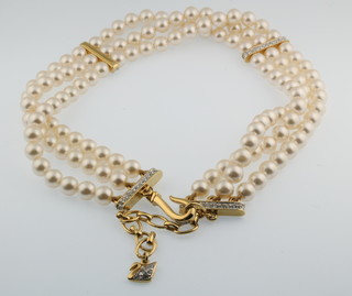 A Swarovski crystal and imitation pearl necklace
