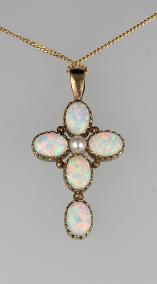 A 9ct gold opal and pearl cross on a gold chain and a pair of similar earrings