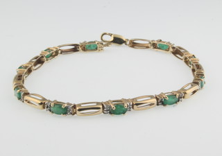 A 10ct gold emerald and diamond bracelet 