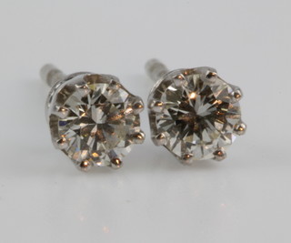 A pair of 18ct white gold single stone earstuds, each approx. 0.4ct 