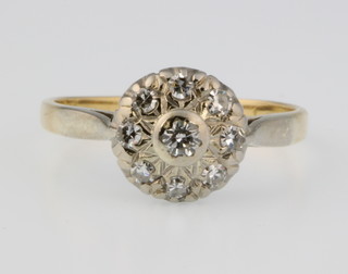 An 18ct gold diamond cluster ring, size M