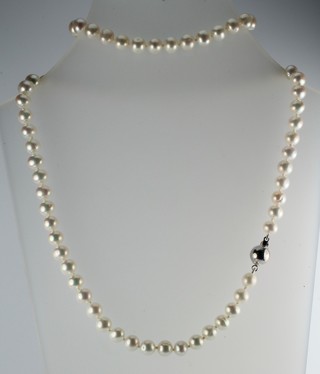 A cultured pearl necklace and bracelet with 14ct white gold clasp 