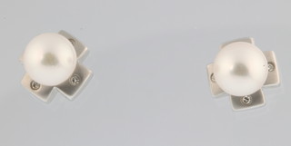 A pair of 18ct white gold cultured pearl ear studs