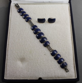 A silver and lapis lazuli bracelet and ear studs