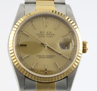 A gentleman's Rolex Oyster perpetual datejust bimetallic wristwatch on a ditto bracelet with original tag