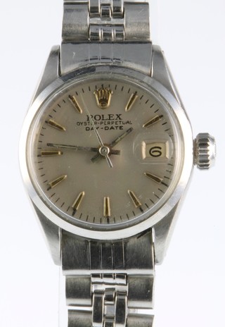 A lady's steel cased Rolex oyster perpetual day/date, the case stamped 1342768 on a ditto bracelet