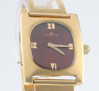 A gentleman's 18ct gold Fortis wristwatch with red dial, 35 grams, having an 18ct gold open bracelet 