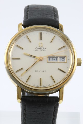 A gentleman's gold plated Omega automatic Deville day/date wristwatch on a leather strap 