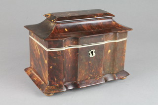 A 19th Century 2 division tortoiseshell tea caddy with ivory mounts of inverted serpentine form on bun feet 8" 