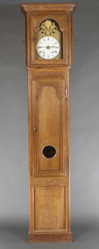 An 18th/19th Century French striking longcase clock the 8 1/2" enamelled dial with Roman numerals marked Nicolas Hagmeaux of Coudies, strikes on a bell (f), contained in an oak panelled trunk with glazed panels to the sides (1f)  91"h 
