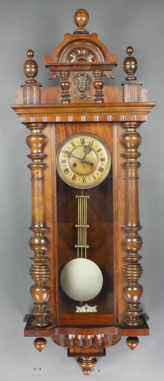 Gustav Becker, a striking Vienna style regulator with 6 1/2" paper dial and Roman numerals, contained in a walnut case 