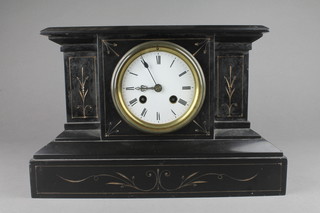 A French 8 day striking mantel clock with enamelled dial and Roman numerals contained in a black marble case 