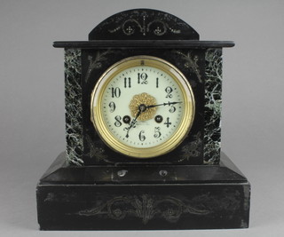 A Victorian French 8 day striking mantel clock with enamelled dial, Arabic numerals, contained in a 2 colour arch shaped marble case 
