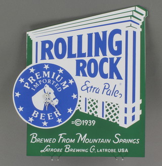 An enamelled advertising clock for Rolling Rock 20" x 8" x 17 1/2" 