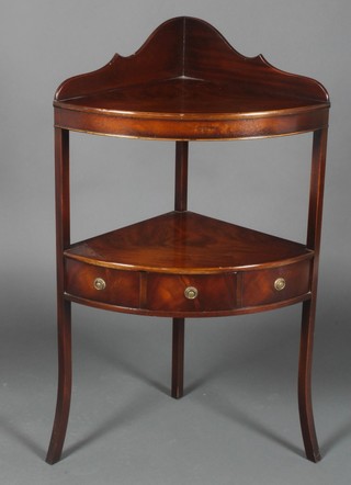 A Georgian style mahogany two tier corner washstand with raised back, the base fitted 1 drawer, raised on splayed supports 37"h x 22"w x 16"d