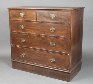 A 19th Century mahogany chest of 2 short and 2 long drawers with brass pierced drop handles, raised on a platform base, fitted 2 short and 3 long drawers 40 1/2"h x 43"w x 21"d 