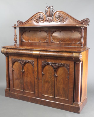 A Victorian mahogany chiffonier with raised back, fitted 2 secret drawers above arched panelled doors and with columns to the side 62"h x 54"w x 18"d