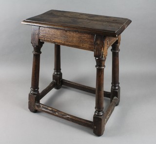 A 17/18th Century rectangular oak joyned stool raised on square tapered supports with box frame stretcher 22"h x 19"w x 11"d