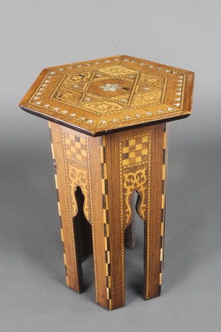 A Moorish octagonal table inlaid mother of pearl 18"h x 12" d