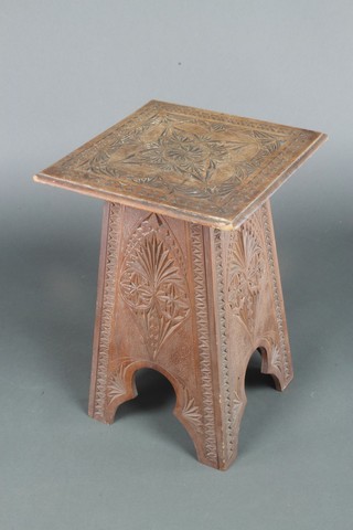 An Art Nouveau square carved hardwood occasional table raised on a tapered column 16"h x 11"w x 11"d  