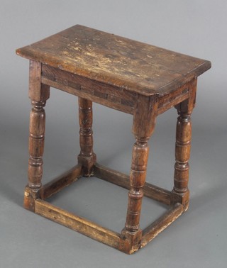 An 18th/19th Century carved oak joint stool, raised on turned and block supports with box framed stretcher 19"h x 18"w x 11 1/2"d  