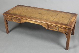 A Chippendale style rectangular mahogany occasional table with inset brown writing surface, fitted 2 short drawers, raised on square tapering supports 17"h x 48"w x 20"d