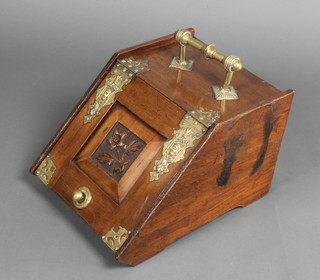 A Victorian carved oak coal box with embossed brass hinges complete with zinc liner 10"h x 16"w x 12"d 