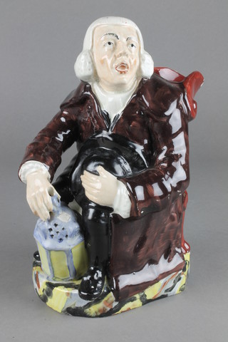 A 19th Century Staffordshire jug in the form of a seated Night Watchman 9 1/2" 