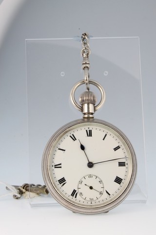 A silver cased pocket watch with seconds at 6 o'clock on a ditto watch chain 