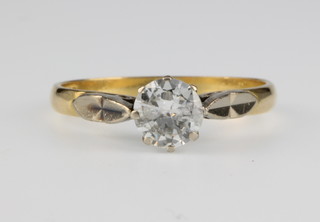 An 18ct yellow gold single stone diamond ring, approx 0.65ct, size L 1/2