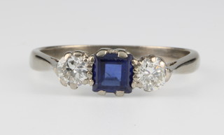 An 18ct white gold 3 stone diamond and sapphire ring, size N