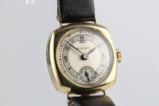 A lady's 9ct gold Rolex wristwatch, the seconds at 6 o'clock on a leather bracelet