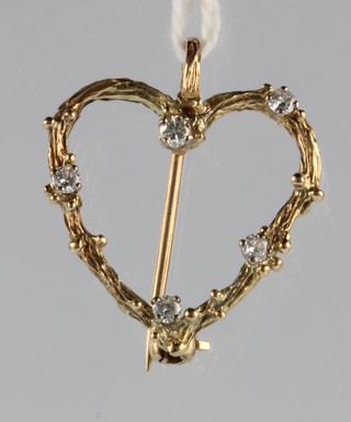 A 9ct gold diamond heart shaped pendant brooch 