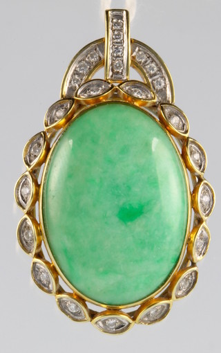 A 14ct gold jade and diamond set pendant 