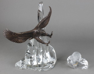 A modern French glass paperweight in the form of a polar bear catching a fish 3", a ditto ornament of an eagle landing on a glacier 11" 