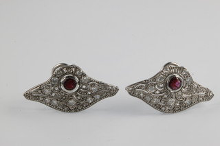 A pair of platinum, ruby and diamond Art Deco style ear clips 