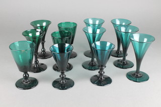 5 19th Century green glass trumpet wines, 7 other green glass wines 