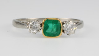 A platinum 3 stone emerald and diamond ring, size P 1/2