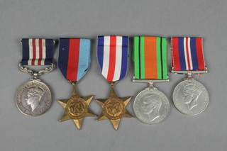 Military Medal, a group to 214553730 GNR. V. F. Langham Military medal 1939-45, France and Germany stars, Defence and War medal and with associated paperwork 
 