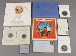 An Isle of Man proof coin set, 7 stamped envelopes, minor commemorative coins etc 