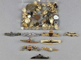 A collection of submarine badges including Russian etc 