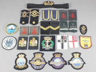 A collection of mainly submarine and other Naval cloth insignia