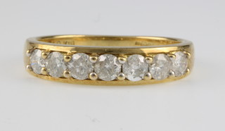 An 18ct yellow gold 7 stone diamond ring 0.75ct, size M 1/2