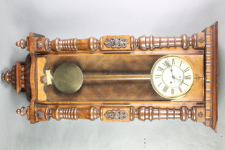A Vienna style striking regulator, the 8" paper dial with Roman numerals and subsidiary second hand, contained in a walnut case  