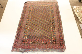 A red ground belouche rug 85" x 52 1/2" 