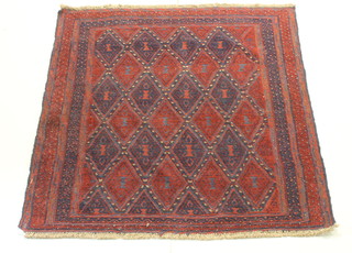 A red and blue ground Gazak rug with all-over diamond design 57" x 51" 