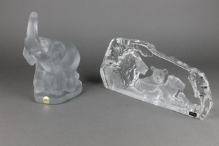 A Goebels glass figure of an elephant 11", a Costa glass paperweight in the form of a lion and lionesses 12" 